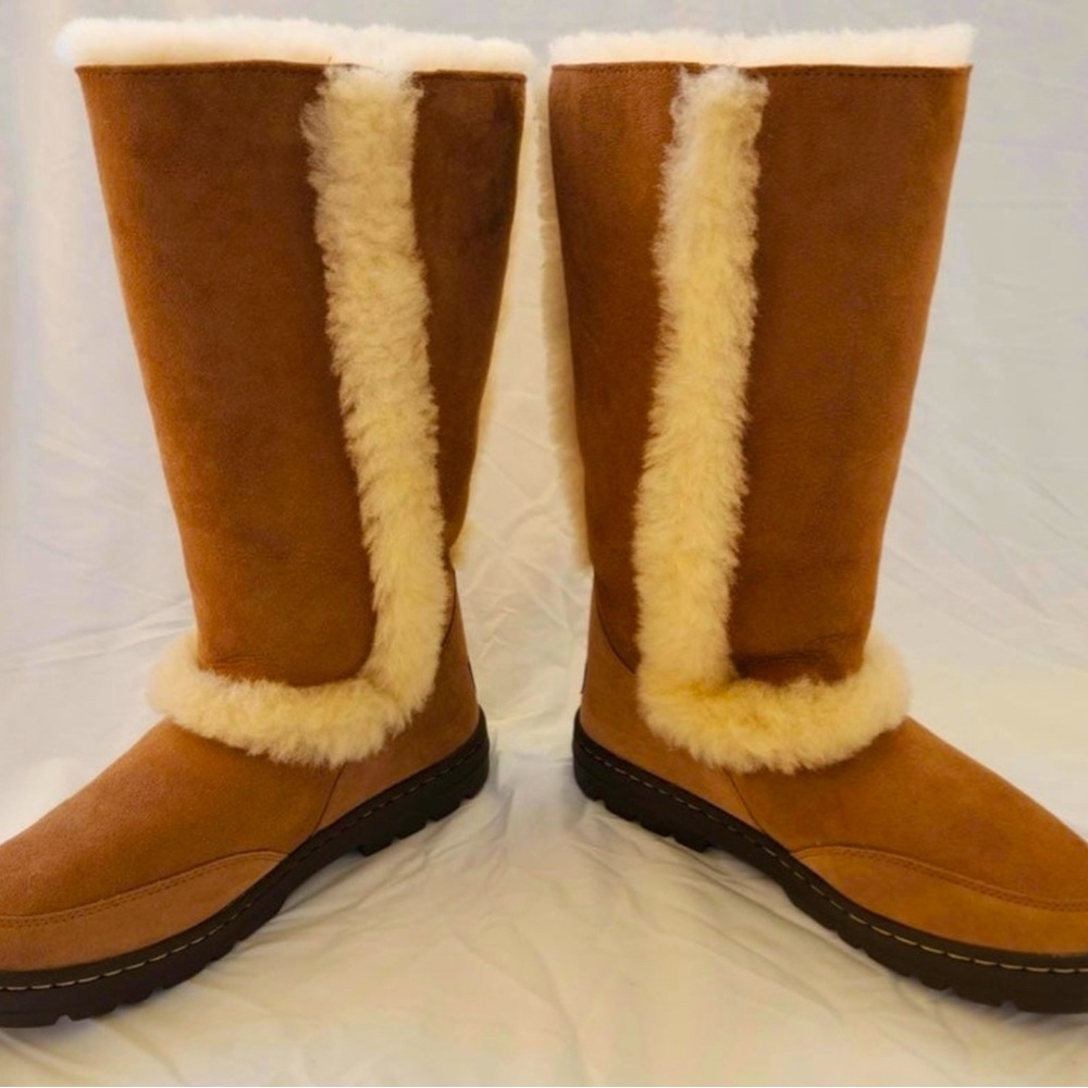 Tall sunburst Uggs. Size 6 NWT and box.